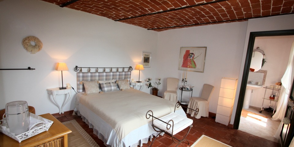 
			One of the guest rooms, with ensuite bathroom
			